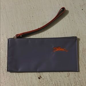 Longchamp Blue Cosmetic Bag with Orange Accent and Wrist Strap